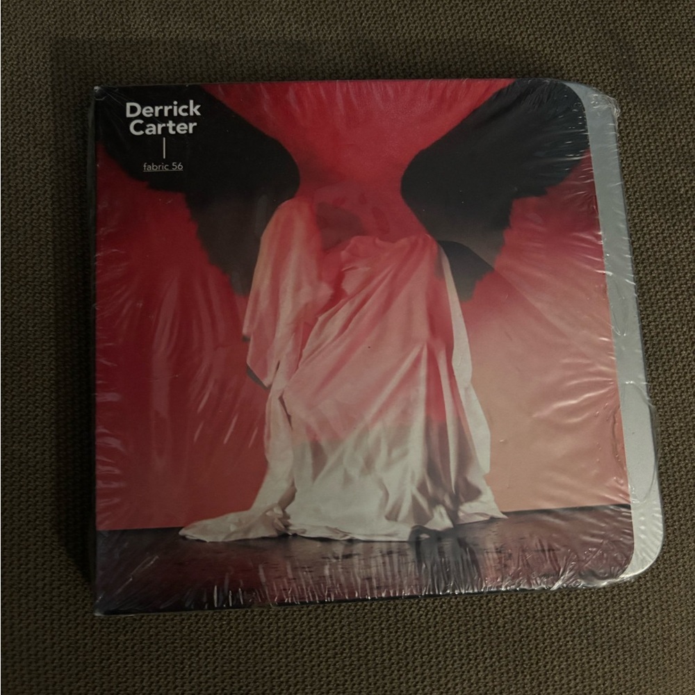 Fabric 56 Music CD with Red and Black Design